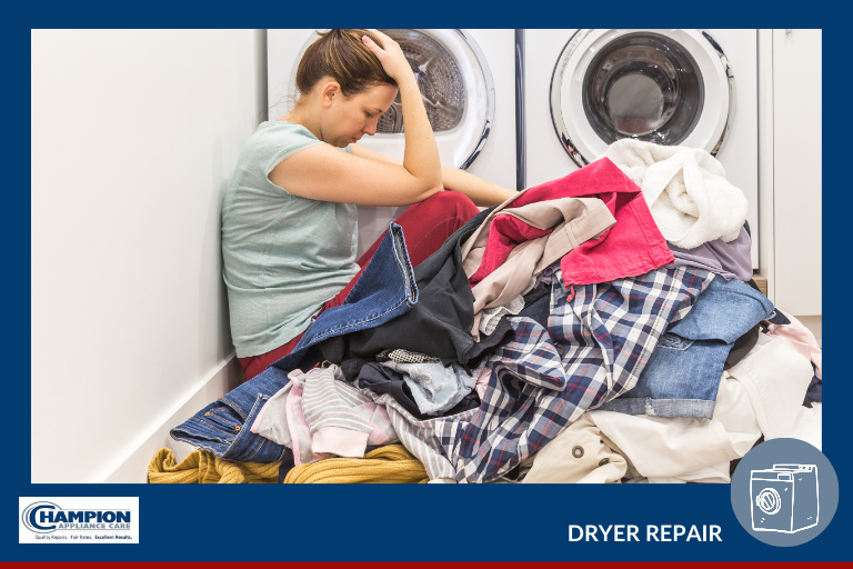 woman sitting in dirty laundry in front of a washer and dryer