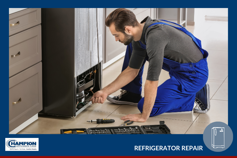 Appliance repair technician servicing a refrigerator